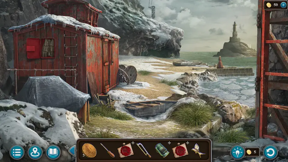 Mystery Detective Adventure 2 jelenet: téli sziklás part egy piros vasúti kocsival és egy távoli világítótoronnyal